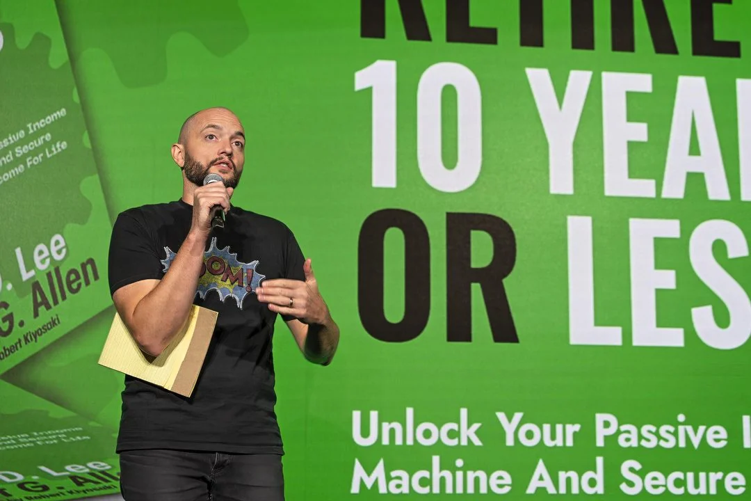 Speaker at the Retire in 10 Years or Less event on stage at the studio