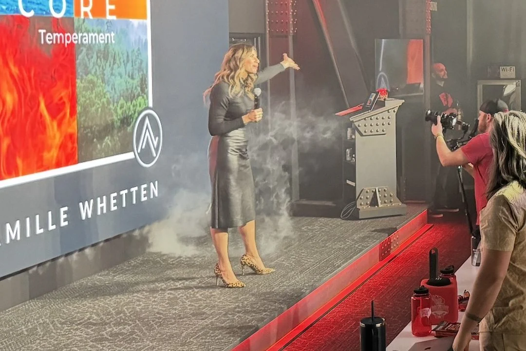 Camille Whetten on stage at the studio
